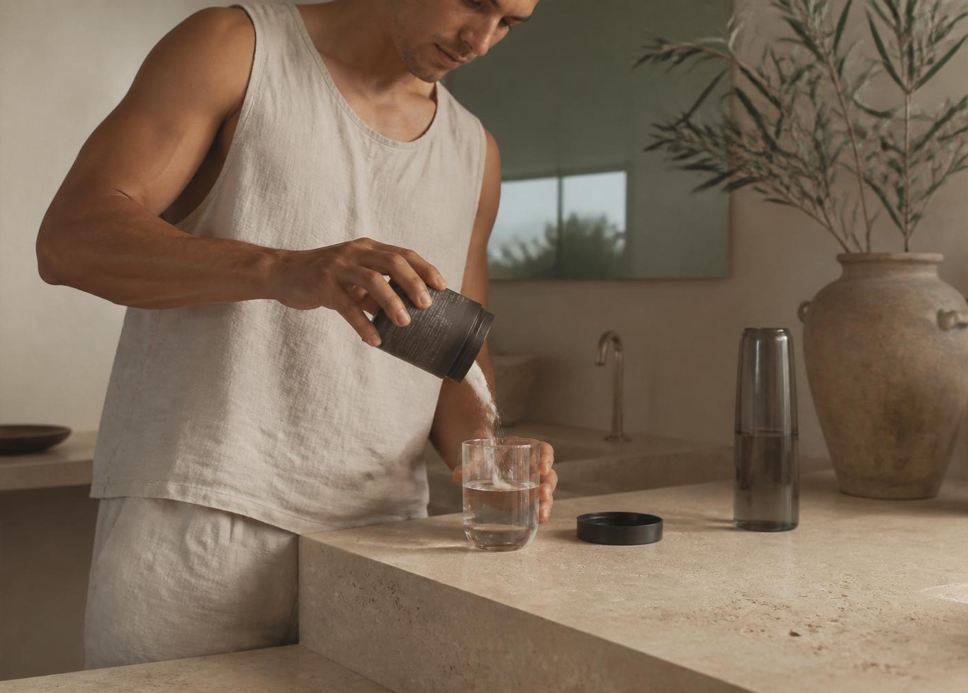 A quiet morning: pouring Californien into a glass of water on stone